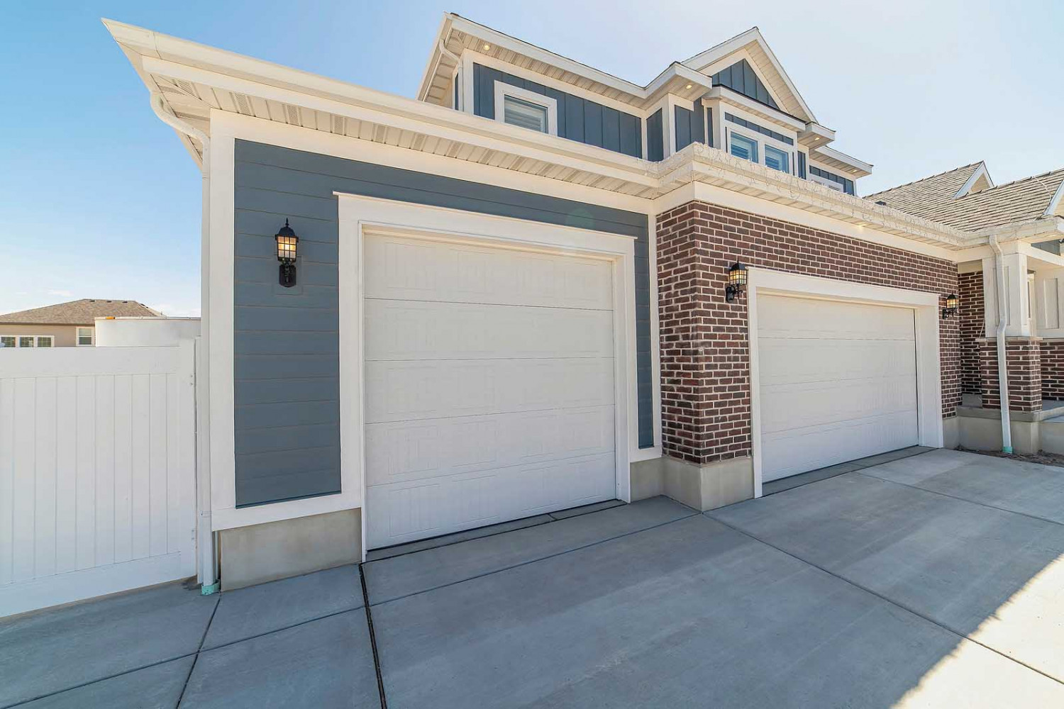 Front view of a home with two garage doors